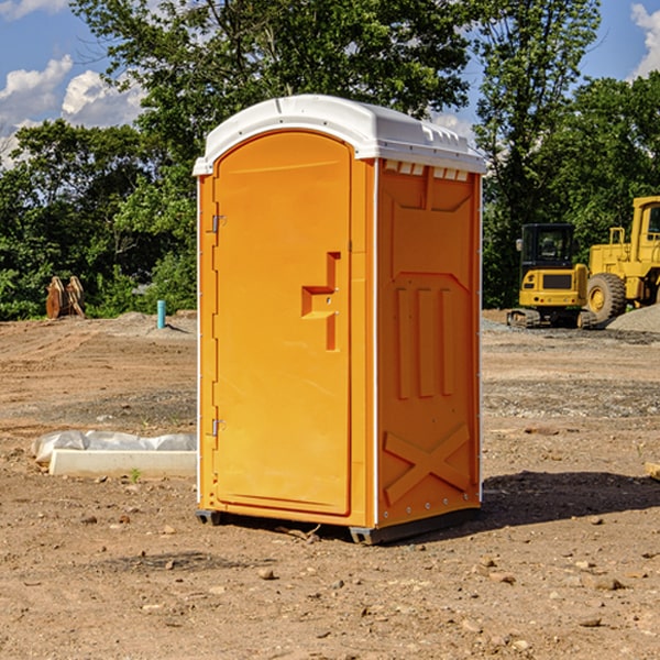 how often are the portable restrooms cleaned and serviced during a rental period in Bluegrove